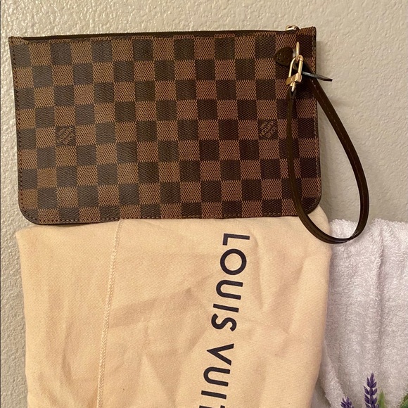Louis Vuitton Handbags - Louis Vuitton (MM Neverfull wristlet)